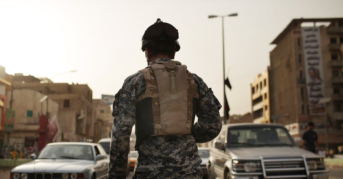 مسلحون يستهدفون معهداً بريطانياً وشركة أمريكية في بغداد (فيديو)