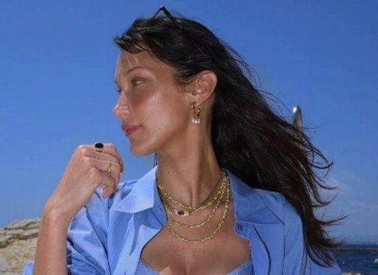 بالصورة: بيلا حديد بالمايوه في دبي.. وهكذا أمضت 48 ساعة