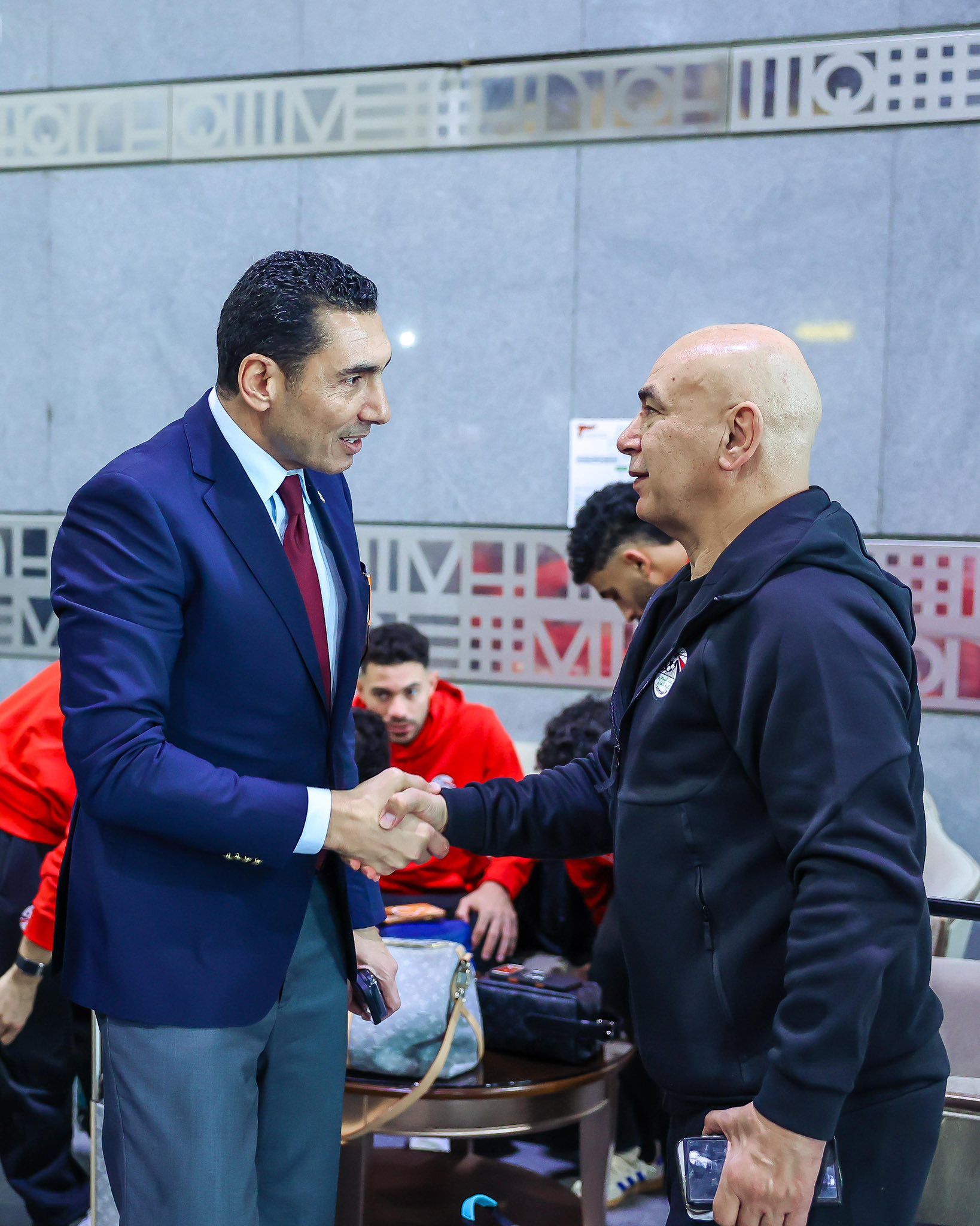 May be an image of one or more people and text