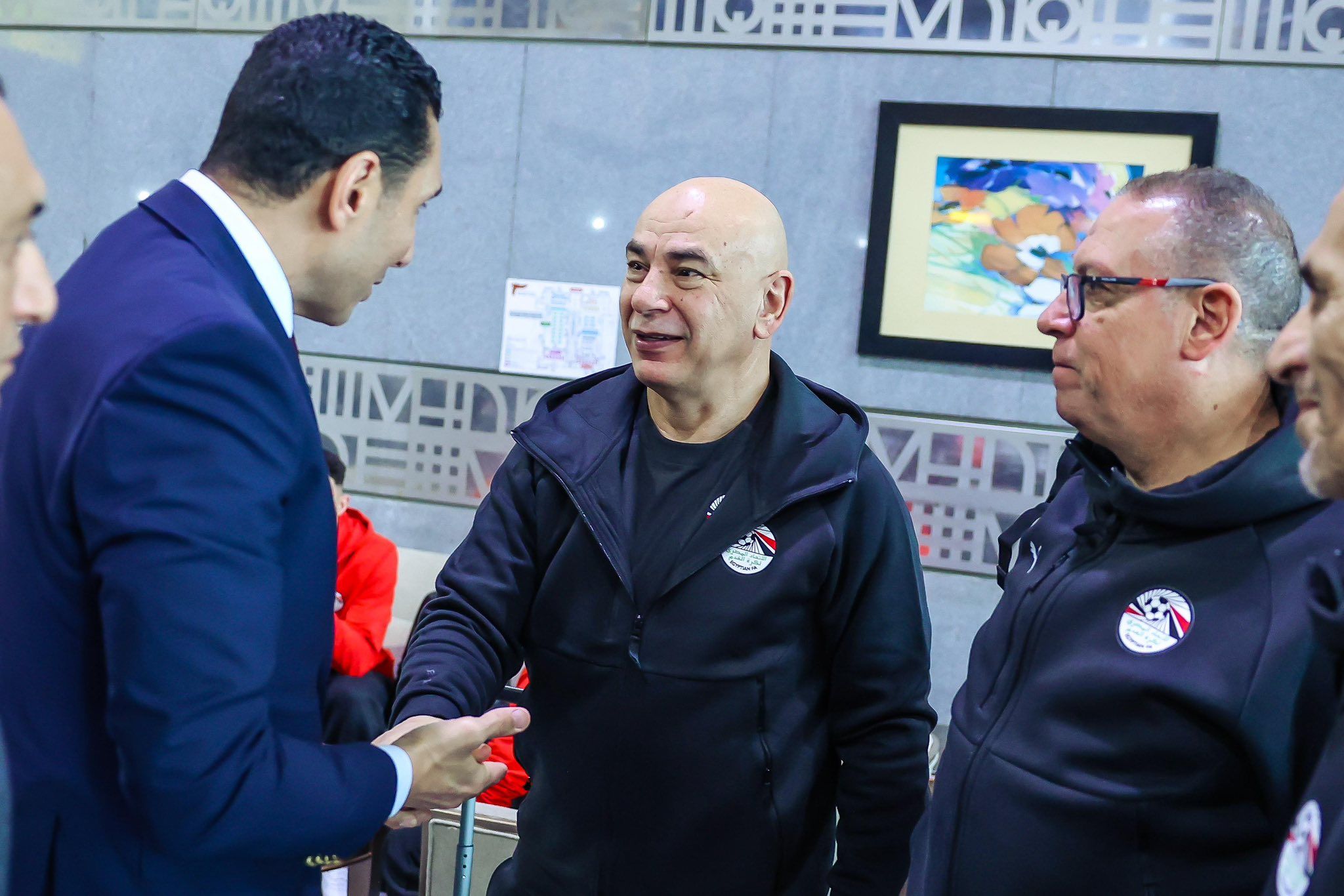 May be an image of one or more people and text