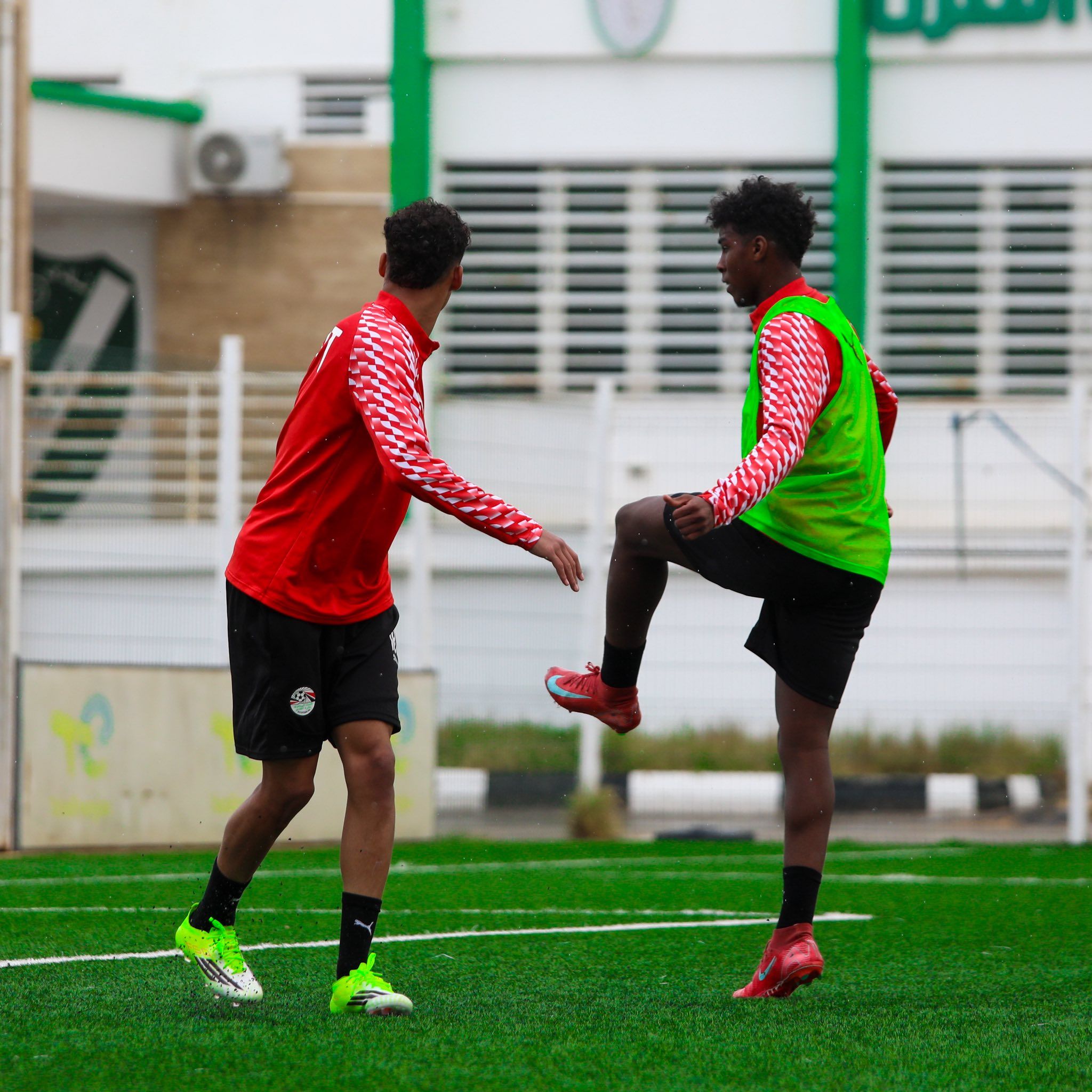 May be an image of one or more people, people playing football and people playing soccer