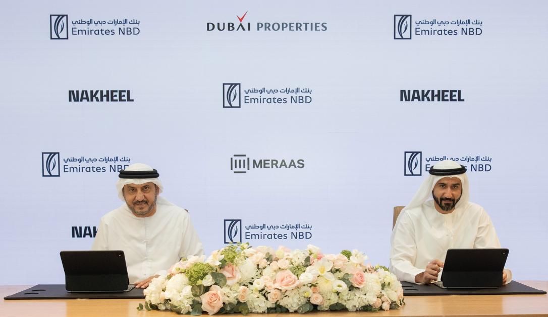 دبي القابضة للعقارات والإمارات دبي الوطني يطلقان شراكة في«مِراس» و«دبي للعقارات» ونخيل